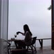 A woman making drip coffee with a beautiful nature view on foggy day - VideoHive Item for Sale