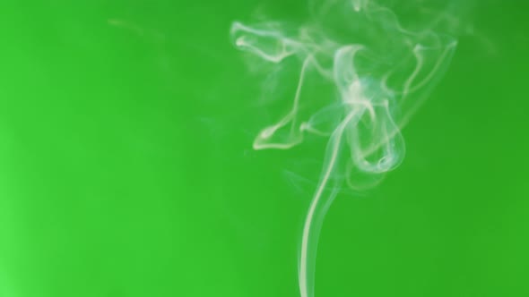 Smoke Jet on Green Chroma Key Background alt