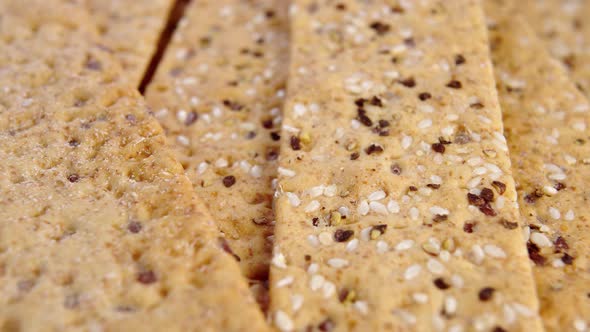 Crunchy crispbreads with sesame and flax seeds. Healthy dietary meal. Macro