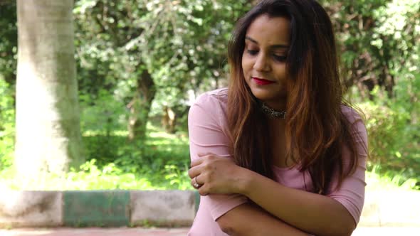 Beautiful Indian woman smiling and looking at the camera