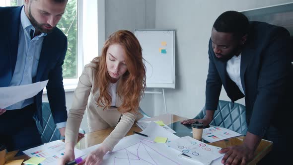 Young Business Financial Team Work Together in Project Brainstorm Meeting at Office