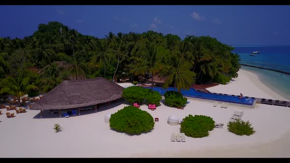 Aerial drone view landscape of exotic coast beach trip by blue ocean with white sandy background of 