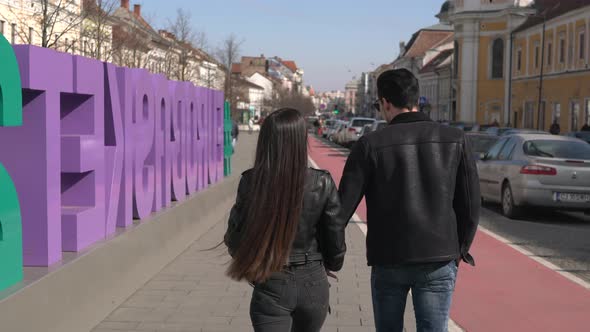 Couple walking in a city