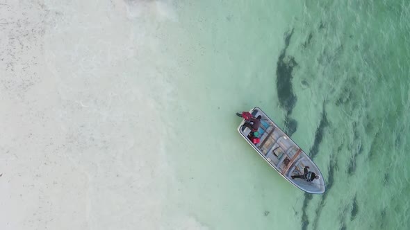 Tanzania Vertical Video  Boat Boats in the Ocean Near the Coast of Zanzibar Aerial View