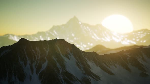 Winter Landscape in Mountains at Sunset