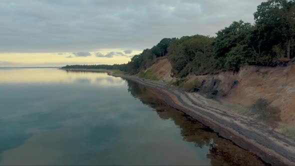 Aerial view of a beach with quiet water