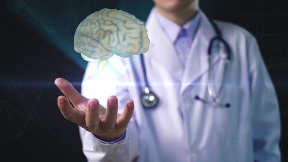 Doctor Hand Holding Holographic Scan Of Human Brain