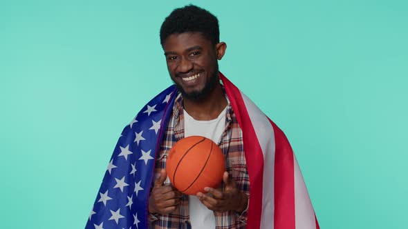 Bearded Young Man Basketball Fan Holding American USA Flag Doing Winner Gesture Dancing Alone