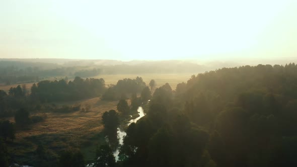 Incredible Nature Panorama Drone Flying Over Beautiful Forest Valley River Covered with Sunrise Mist