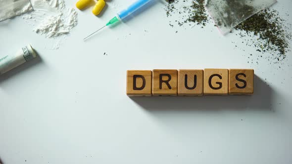 No Drugs Words Made of Wooden Cubes, Hand Cleaning Table From Narcotics, Concept