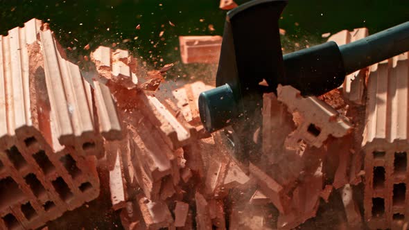 Super Slow Motion Shot of Smashing Brick with Sledgehammer at 1000Fps