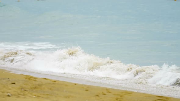 Powerful Wave Breaks Along the Shore