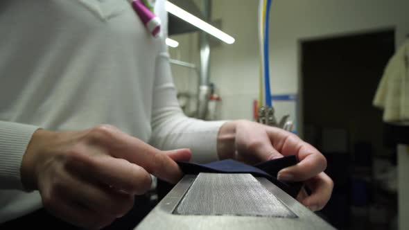 Process of Removing Stain From Man's Suit Jacket