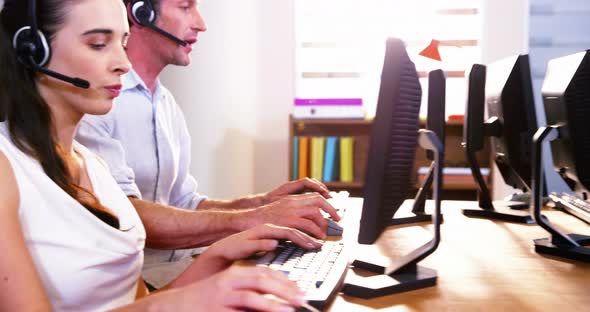 Business executives using headset