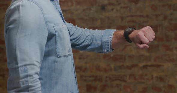 Man checking smartwatch