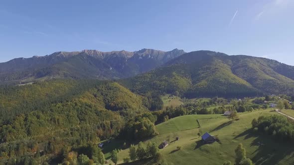 Aerial views of the scenic landscape surrounded by Carpathian Mountains, Brasov, Romania