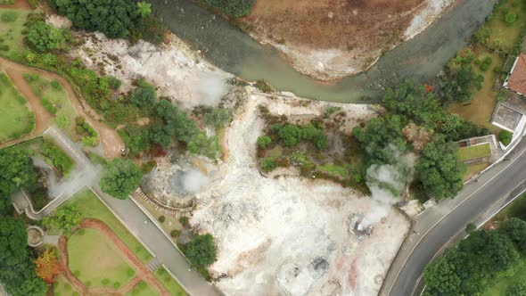 Aerial View Over the Hot Springs Facilities on the Volcanic Shore