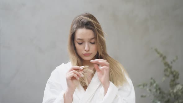 Upset Female Doesn't Like Hair Condition Has Split Ends