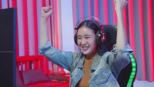 Asian Girl Player Celebrates Victory Video Game