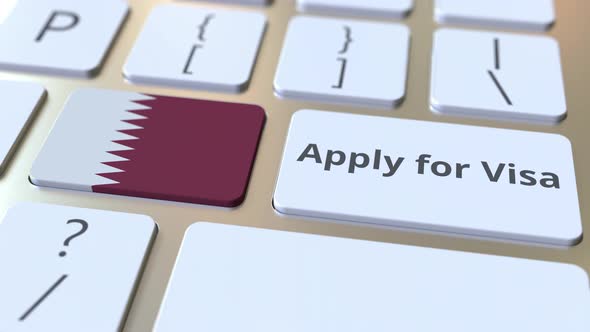 APPLY FOR VISA Text and Flag of Qatar on the Keyboard