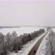 Aerial View of a Cars Driving in a Foggy and Snowy Day - VideoHive Item for Sale