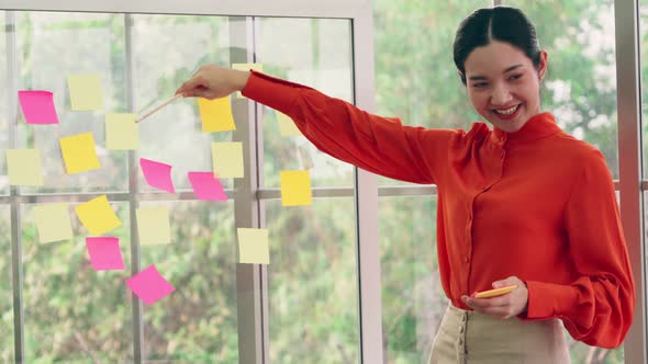 Business People Work on Project Planning Board