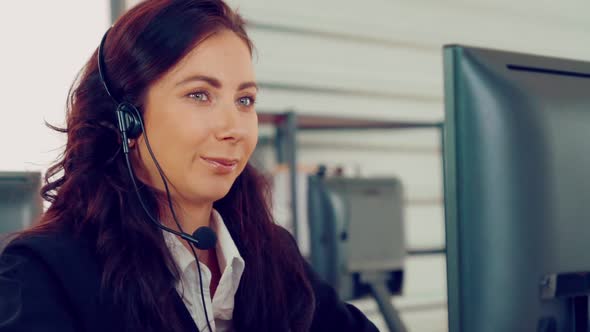 Business People Wearing Headset Working in Office