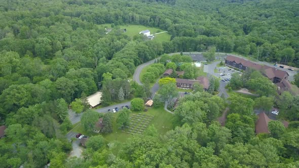 Rising Drone View of a Resort in a Dense Forest in the Mountains of the Poconos in Pennsylvania