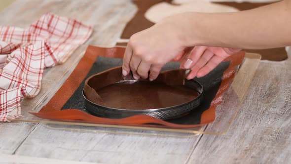 Confectioner Prepares Chocolate Tart at Kitchen