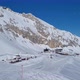 Panorama of ski resort in the german alps. Skiers on a ski slope on a sunny winter day. - VideoHive Item for Sale