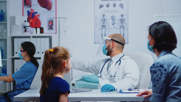 Medical Worker Explaining Radiography