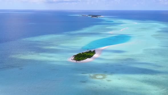 Drone view scenery of exotic coast beach by blue sea with sand background