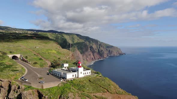 Flying over Ponta do Pargo lighthouse, built on a cliff, Madeira, Portugal