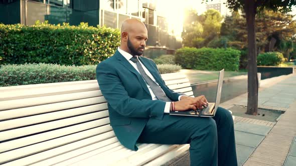 Indian Businessman Holding Laptop Notebook Wearing Blue Suit Near Office