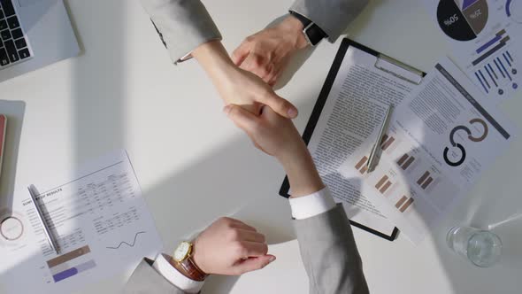 Top Down of Handshake of Two Businessmen