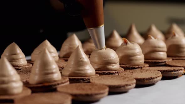 Chef Is Making Caramel Macarons, Close-up.