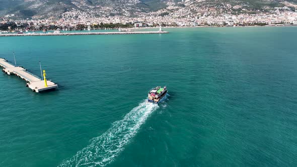 Yacht calls at the port aerial view 4 K