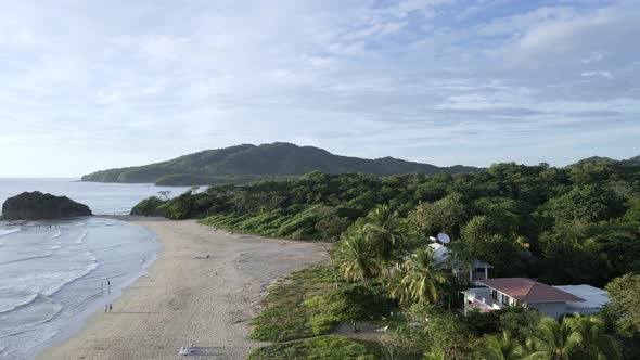 4k aerial hyper lapse of Playa Grande near Tamarindo, Guanacaste. Fast fly-over at Grande beach duri