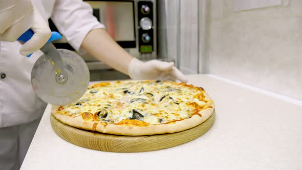 Cutting Pizza with a Specialized Tool