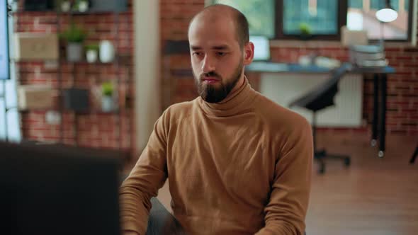 Portrait of Financial Manager Working on Computer to Plan Economy Growth