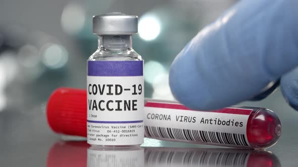 Covid-19 Vaccine and Coronavirus antibodies vials in medical lab