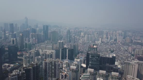 Guangzhou, China. Aerial shot of Tianhe district with congested living building blocks and office bu