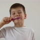 Kid Boy Brushing His Teeth Using Tooth Brush and Oral Paste Cleaning Teeth - VideoHive Item for Sale