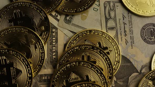 Rotating shot of Bitcoins (digital cryptocurrency) - BITCOIN 