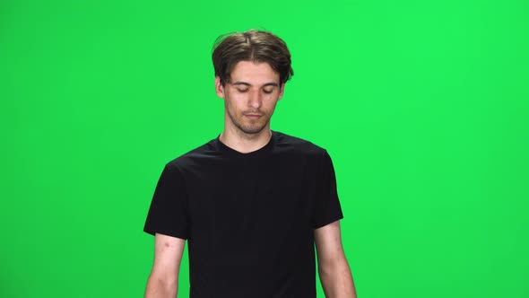 Brunette Man Walking on a Green Screen, Chroma Key