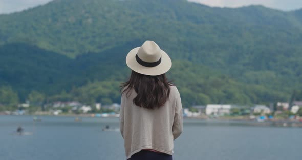 Woman look at the sea and mountain