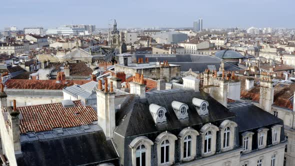 Church of Notre Dame in Bordeaux France along with the dome of Les Grands Hommes commercial center,