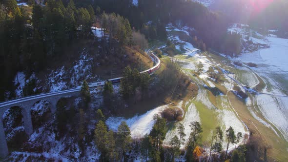 A Train in Switzerland Passing through Beautiful Landscapes