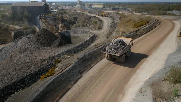 Mine Truck Driving Ore to a Processing Plant