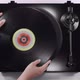 Hands Putting Vinyl Record on Black Turntable Top View - VideoHive Item for Sale